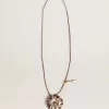 Anhänger mit Blumenmotiv aus hellbraunem und champagnerfarbenem Leder Anhänger mit Blumenmotiv aus hellbraunem und champagnerfarbenem Leder