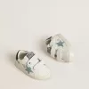 Baby School aus weißem Nappaleder mit hellblauem Wildlederstern und Tennismotiv Baby School aus weißem Nappaleder mit hellblauem Wildlederstern und Tennismotiv