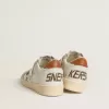 Ball Star mit Stern aus Ponyfell mit Animal-Print und Fersenlasche aus tabakfarbenem Leder