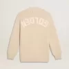 Beigefarbene Damenstrickjacke mit „Golden”-Schriftzug auf der Rückseite Beigefarbene Damenstrickjacke mit „Golden”-Schriftzug auf der Rückseite