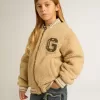Beigefarbene Fleece-Bomberjacke für Kinder