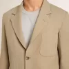 Beigefarbene Herrenjacke mit Nadelstreifen und einreihiger Knopfleiste in Oversize-Passform