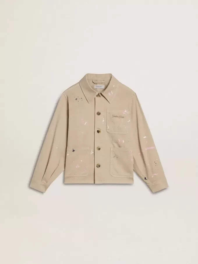 Beigefarbene Kinderjacke mit bunten Sprenkeln Beigefarbene Kinderjacke mit bunten Sprenkeln