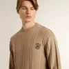 Beiger Herrenpullover mit gesticktem Logo Beiger Herrenpullover mit gesticktem Logo