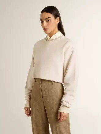 Cremefarbenes, kurz geschnittenes Sweatshirt für Damen aus Baumwolle mit Kristallen auf der Vorderseite