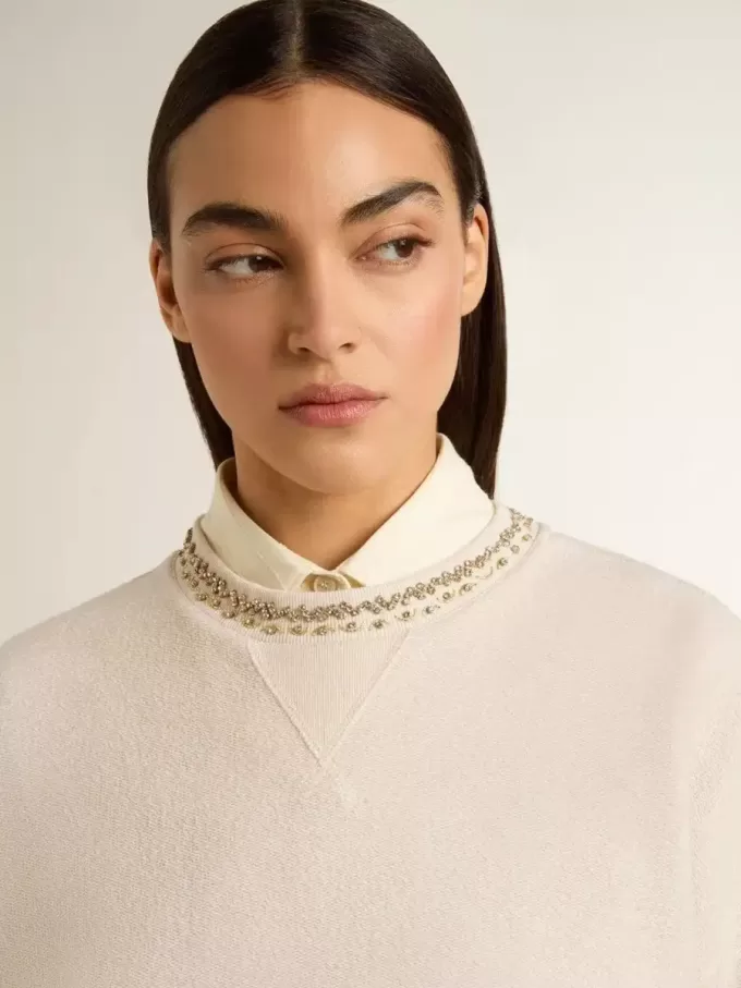 Cremefarbenes, kurz geschnittenes Sweatshirt für Damen aus Baumwolle mit Kristallen auf der Vorderseite Cremefarbenes, kurz geschnittenes Sweatshirt für Damen aus Baumwolle mit Kristallen auf der Vorderseite
