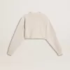 Cremefarbenes, kurz geschnittenes Sweatshirt für Damen aus Baumwolle mit Kristallen auf der Vorderseite Cremefarbenes, kurz geschnittenes Sweatshirt für Damen aus Baumwolle mit Kristallen auf der Vorderseite