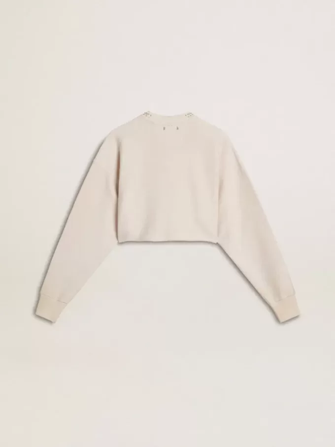Cremefarbenes, kurz geschnittenes Sweatshirt für Damen aus Baumwolle mit Kristallen auf der Vorderseite Cremefarbenes, kurz geschnittenes Sweatshirt für Damen aus Baumwolle mit Kristallen auf der Vorderseite