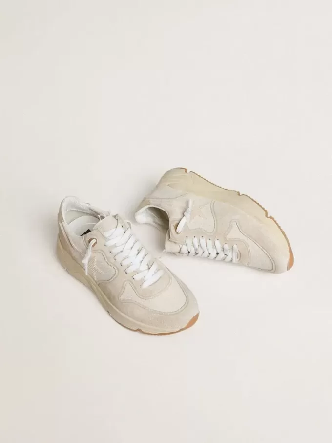 Damen-Laufsohle aus Canvas mit beigem Stern und Fersenlasche aus platinfarbenem Metallic-Leder Damen-Laufsohle aus Canvas mit beigem Stern und Fersenlasche aus platinfarbenem Metallic-Leder