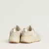 Damen-Laufsohle aus Canvas mit beigem Stern und Fersenlasche aus platinfarbenem Metallic-Leder Damen-Laufsohle aus Canvas mit beigem Stern und Fersenlasche aus platinfarbenem Metallic-Leder
