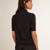 Damen-Poloshirt aus marineblauer Merinowolle Damen-Poloshirt aus marineblauer Merinowolle