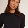 Damen-Poloshirt aus marineblauer Merinowolle Damen-Poloshirt aus marineblauer Merinowolle