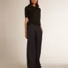 Damen-Poloshirt aus schwarzer Merinowolle Damen-Poloshirt aus schwarzer Merinowolle