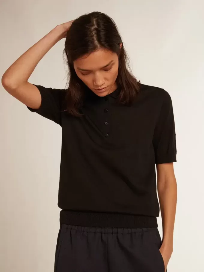 Damen-Poloshirt aus schwarzer Merinowolle Damen-Poloshirt aus schwarzer Merinowolle