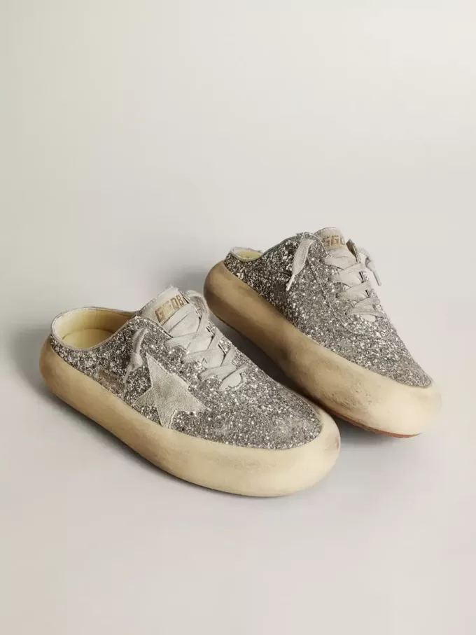 Damen-Sabot „Space-Star” in Glitzeroptik mit eisgrauem Stern und Lasche Damen-Sabot „Space-Star” in Glitzeroptik mit eisgrauem Stern und Lasche