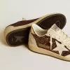 Damen-Sneaker „Ball Star” in Glitzeroptik mit Lederstern und metallischer Lederlasche am Fersenbereich