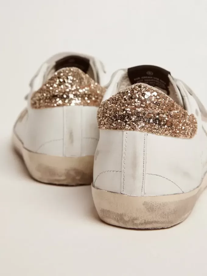 Damen-Sneaker Old School mit goldenem Stern aus laminiertem Leder