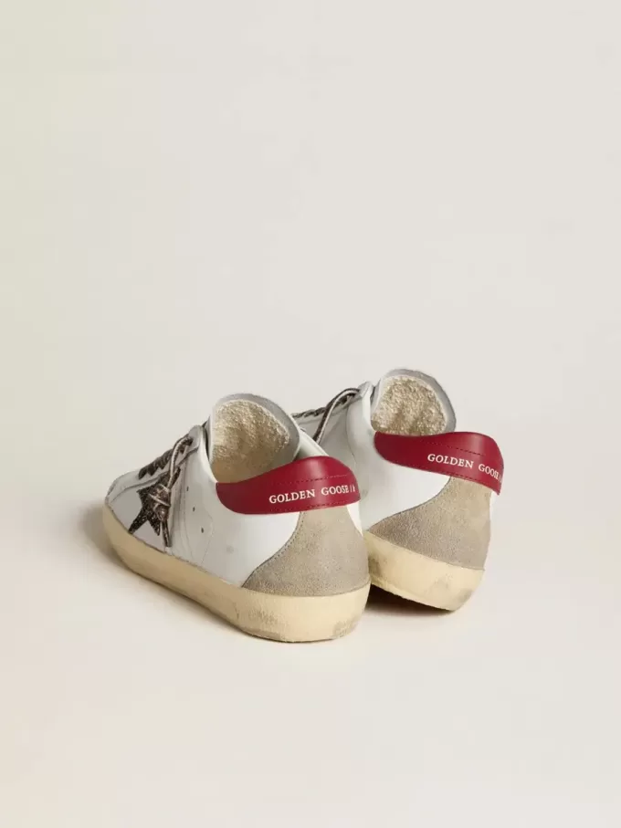 Damen-Super-Star aus Nappa mit Glitzerstern und rotem Nappa-Fersenriemen Damen-Super-Star aus Nappa mit Glitzerstern und rotem Nappa-Fersenriemen