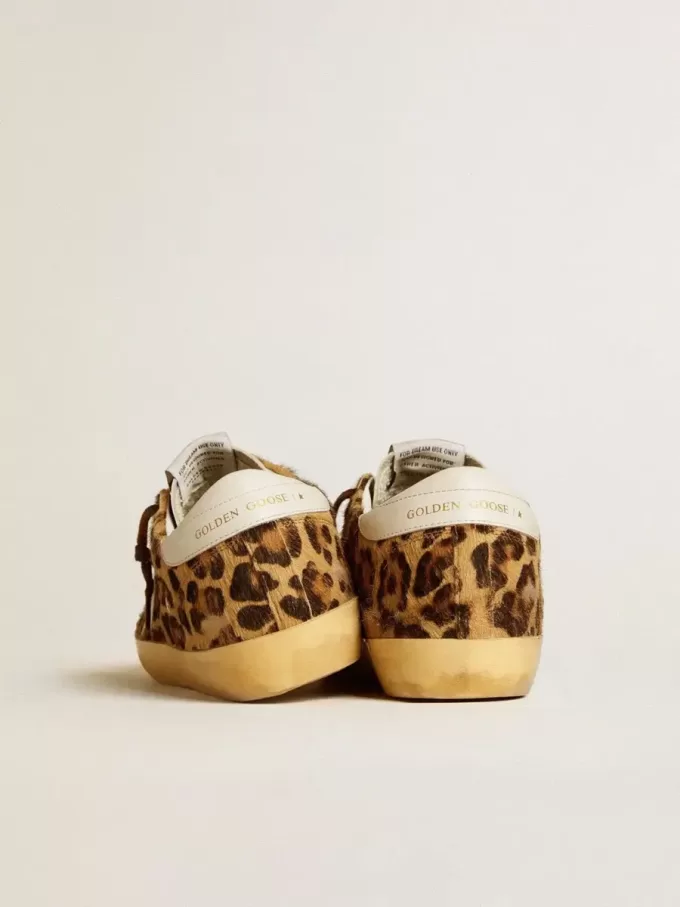 Damen-Super-Star LTD aus Ponyfell mit Leopardenmuster, Lederstern und Fersenlasche