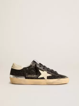 Damen-Superstar in schwarzem Glitzer und Nappa mit cremefarbenem Lederstern und Fersenlasche