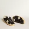Damen-Superstar in schwarzem Glitzer und Nappa mit cremefarbenem Lederstern und Fersenlasche