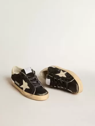 Damen-Superstar in schwarzem Glitzer und Nappa mit cremefarbenem Lederstern und Fersenlasche