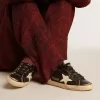 Damen-Superstar in schwarzem Glitzer und Nappa mit cremefarbenem Lederstern und Fersenlasche