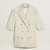 Damenblazer aus weiß-grauer Wollmischung mit Nadelstreifen und kurzen Ärmeln Damenblazer aus weiß-grauer Wollmischung mit Nadelstreifen und kurzen Ärmeln