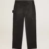 Damenjeans aus schwarzem Baumwollstoff im Distressed-Look mit Patches auf der Vorderseite