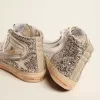 Damenslipper mit laminiertem Obermaterial aus Leder und silbernem Glitzer