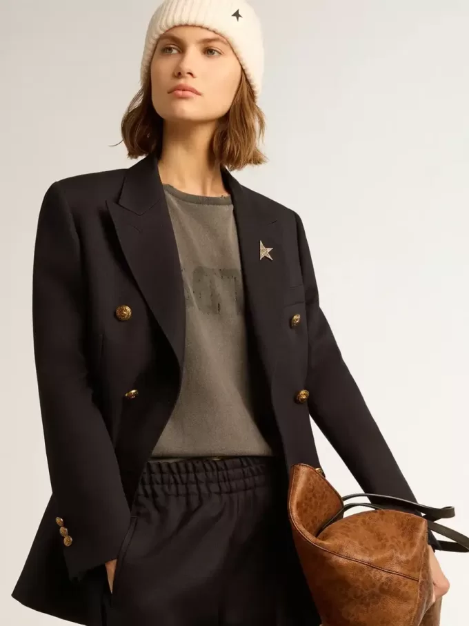 Dunkelblauer Damenblazer mit doppelter Knopfleiste Dunkelblauer Damenblazer mit doppelter Knopfleiste