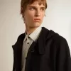 Dunkelblauer Dufflecoat aus Wolle mit Kapuze und Knebelverschluss Dunkelblauer Dufflecoat aus Wolle mit Kapuze und Knebelverschluss