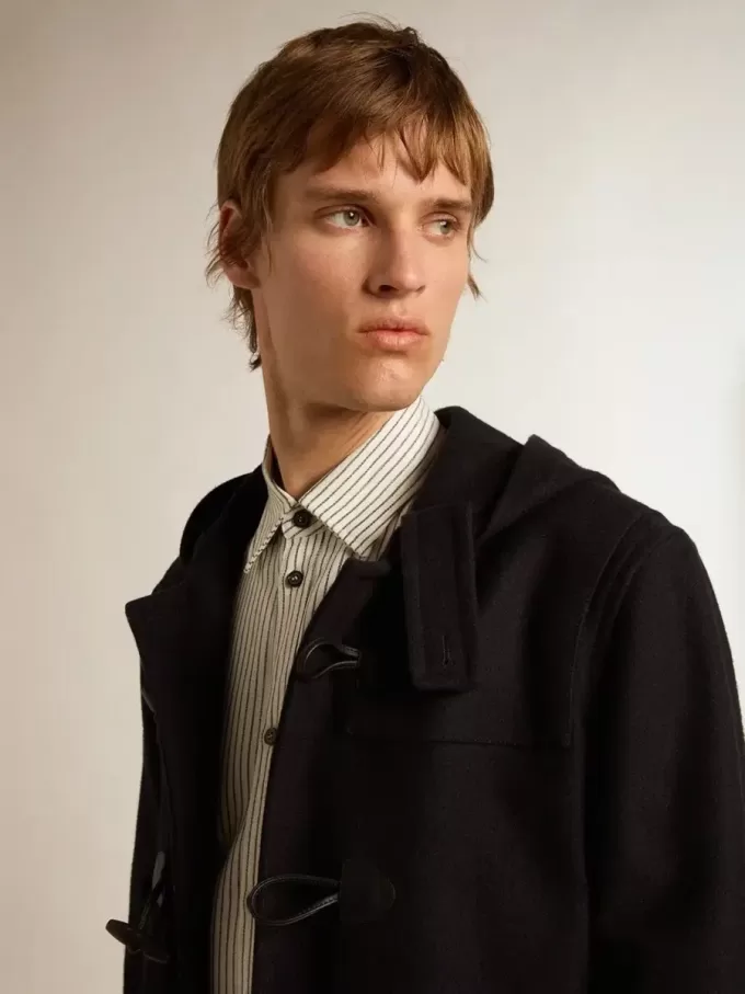 Dunkelblauer Dufflecoat aus Wolle mit Kapuze und Knebelverschluss Dunkelblauer Dufflecoat aus Wolle mit Kapuze und Knebelverschluss
