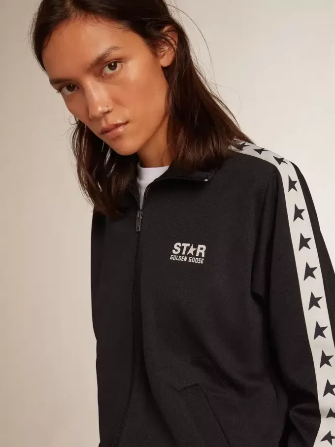 Dunkelblaues Sweatshirt mit Reißverschluss, weißem Streifen und kontrastierenden Sternen Dunkelblaues Sweatshirt mit Reißverschluss, weißem Streifen und kontrastierenden Sternen