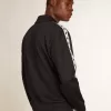 Dunkelblaues Sweatshirt mit weißem Streifen und kontrastierenden blauen Sternen