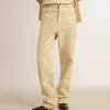 Ecrufarbene Hose mit transparenten Pailletten