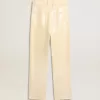 Ecrufarbene Hose mit transparenten Pailletten