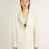 Einreihige Oversize-Jacke in Weiß mit Seideneffekt und Stickerei Einreihige Oversize-Jacke in Weiß mit Seideneffekt und Stickerei