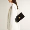 Gioia Tasche aus schwarzem Leder mit Golddetails Gioia Tasche aus schwarzem Leder mit Golddetails