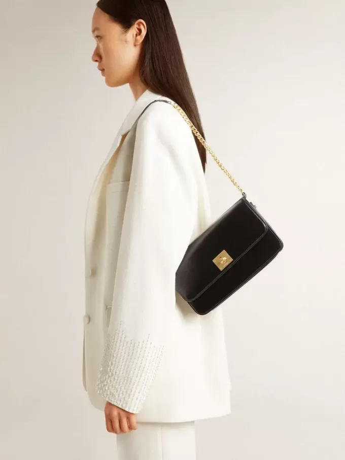 Gioia Tasche aus schwarzem Leder mit Golddetails Gioia Tasche aus schwarzem Leder mit Golddetails
