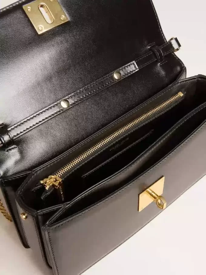 Gioia Tasche aus schwarzem Leder mit Golddetails Gioia Tasche aus schwarzem Leder mit Golddetails