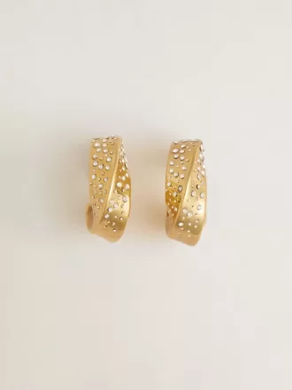 Goldfarbene Creolen mit Kristallen