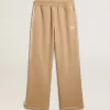 Hellbeige Jogginghose für Herren mit weißem Logo Hellbeige Jogginghose für Herren mit weißem Logo