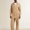 Hellbeige Jogginghose für Herren mit weißem Logo Hellbeige Jogginghose für Herren mit weißem Logo