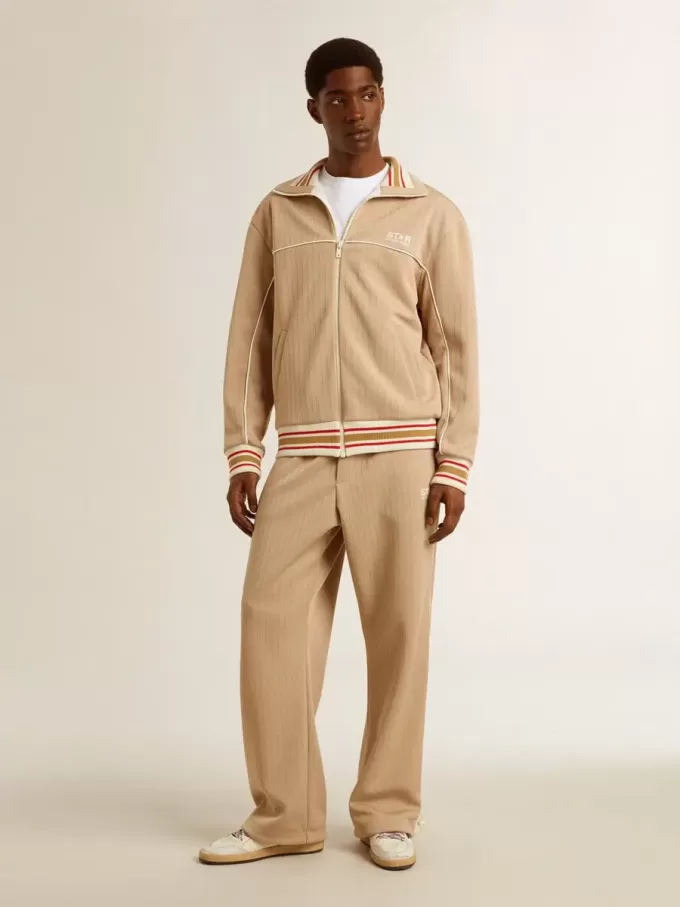 Hellbeige Jogginghose für Herren mit weißem Logo Hellbeige Jogginghose für Herren mit weißem Logo