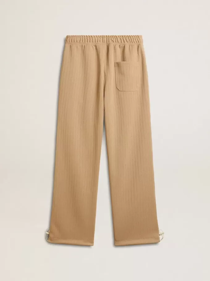 Hellbeige Jogginghose für Herren mit weißem Logo Hellbeige Jogginghose für Herren mit weißem Logo