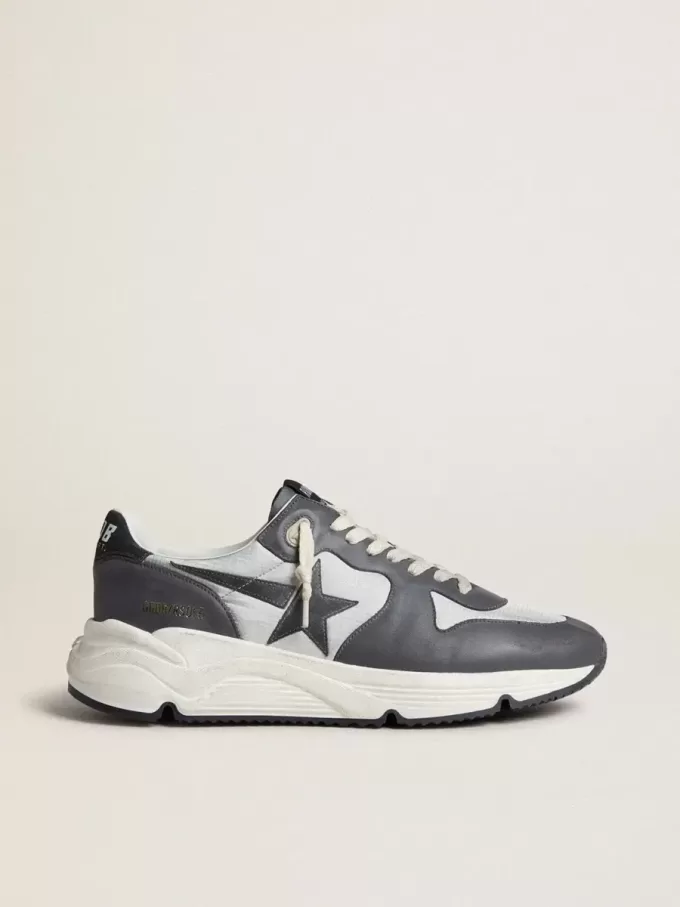 Herren-Laufsohle aus grauem Nylon und schwarzem Nappaleder mit schwarzem Wildlederstern Herren-Laufsohle aus grauem Nylon und schwarzem Nappaleder mit schwarzem Wildlederstern