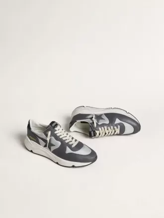 Herren-Laufsohle aus grauem Nylon und schwarzem Nappaleder mit schwarzem Wildlederstern Herren-Laufsohle aus grauem Nylon und schwarzem Nappaleder mit schwarzem Wildlederstern