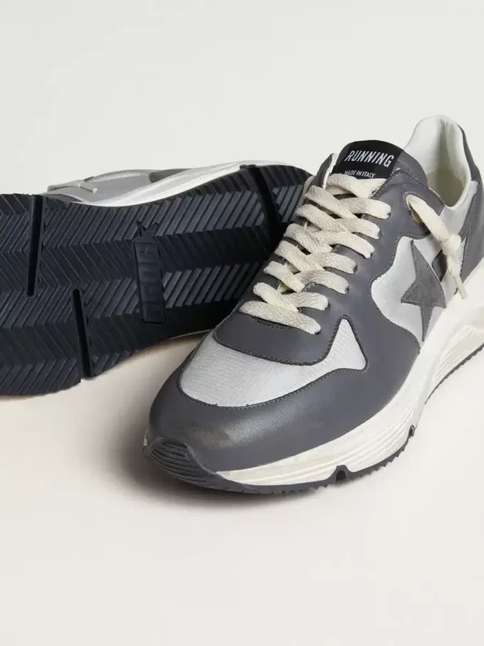 Herren-Laufsohle aus grauem Nylon und schwarzem Nappaleder mit schwarzem Wildlederstern Herren-Laufsohle aus grauem Nylon und schwarzem Nappaleder mit schwarzem Wildlederstern