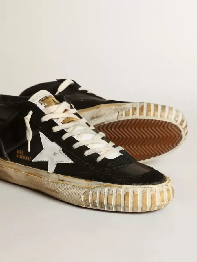 Herren-Mid Star aus schwarzem Nappaleder und Wildleder mit weißem Lederstern Herren-Mid Star aus schwarzem Nappaleder und Wildleder mit weißem Lederstern